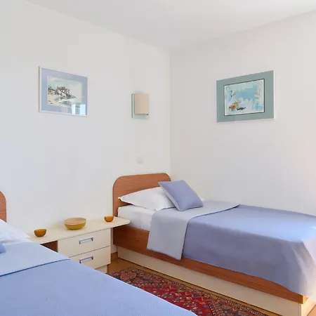 With Two Separate Four-bed Apartments, Private Pool, Grill And Garage