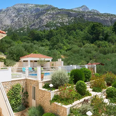 With Two Separate Four-bed Apartments, Private Pool, Grill And Garage *