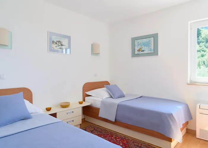 With Two Separate Four-bed Apartments, Private Pool, Grill And Garage