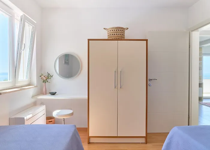 With Two Separate Four-bed Apartments, Private Pool, Grill And Garage Vila