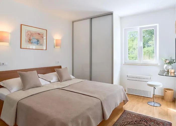 With Two Separate Four-bed Apartments, Private Pool, Grill And Garage