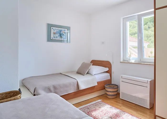 With Two Separate Four-bed Apartments, Private Pool, Grill And Garage