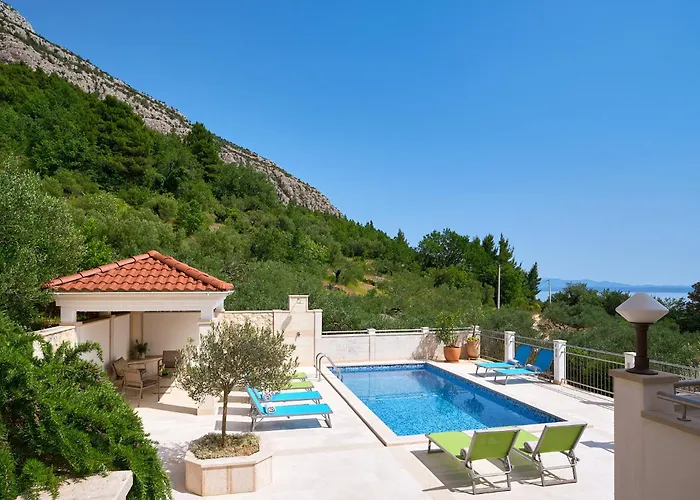 With Two Separate Four-bed Apartments, Private Pool, Grill And Garage Vila